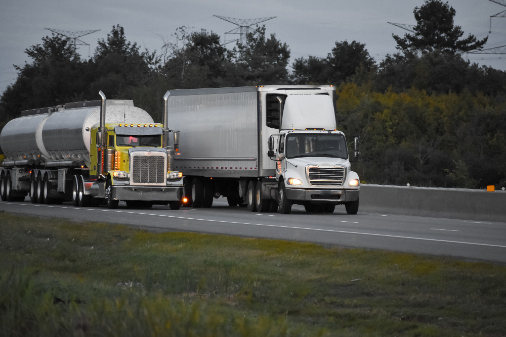 trailer-trucks-driving-road